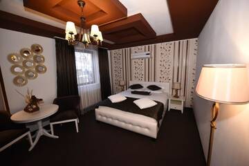 Фото номера Номер Делюкс с камином Гостевой дом Rixo`s GuestHouse г. Крайова 2