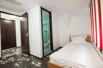 Фото номера Классический двухместный номер с 2 отдельными кроватями Отель Hotel Safta Residence г. Крайова 6