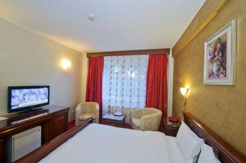 Фото номера Стандартный двухместный номер с 1 кроватью Отель Hotel Bavaria г. Крайова 10