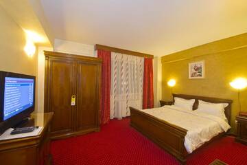 Фото номера Стандартный люкс с 1 спальней Отель Hotel Bavaria г. Крайова 2
