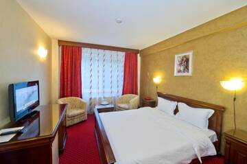 Фото номера Стандартный двухместный номер с 1 кроватью Отель Hotel Bavaria г. Крайова 7