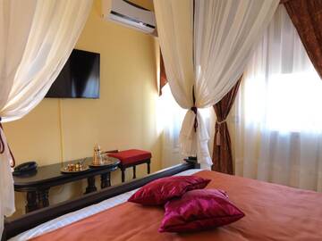 Фото номера Двухместный номер Делюкс с 1 кроватью Гостевой дом La Favorita Guesthouse Boutique г. Крайова 20