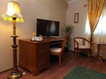 Фото номера Двухместный номер Делюкс с 1 кроватью Гостевой дом La Favorita Guesthouse Boutique г. Крайова 13
