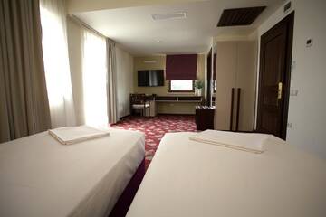 Фото номера Классический двухместный номер с 2 отдельными кроватями Отель Hotel Relax Craiova г. Крайова 2