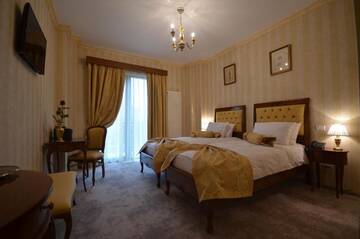 Фото номера Одноместный номер с балконом Отель The Arlington Hotel г. Крайова 2