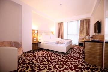 Фото номера Стандартный двухместный номер с 1 кроватью Отель Hotel Articus г. Крайова 4