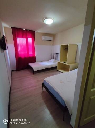 Фото номера Двухместный номер с 2 отдельными кроватями Хостелы Alfredo Hostel г. Крайова 5