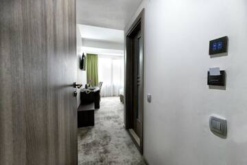 Фото номера Улучшенный двухместный номер Делюкс с 1 кроватью Отель Prestige Boutique Hotel Craiova г. Крайова 4