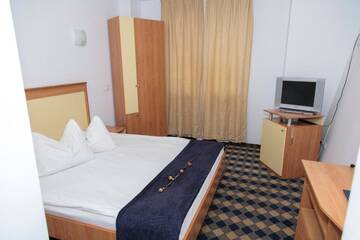 Фото номера Двухместный номер с 1 кроватью Отель Plus Hotel г. Крайова 4