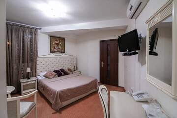 Фото номера Стандартный двухместный номер с 1 кроватью Отель Hotel Royal Craiova г. Крайова 4