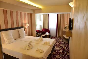 Фото номера Двухместный номер с 1 кроватью или 2 отдельными кроватями Отель Hotel Craiovita г. Крайова 5