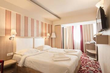 Фото номера Двухместный номер с 1 кроватью или 2 отдельными кроватями Отель Hotel Craiovita г. Крайова 8