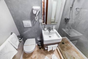 Фото номера Стандартный двухместный номер с 1 кроватью Отель Hotel Europeca г. Крайова 10