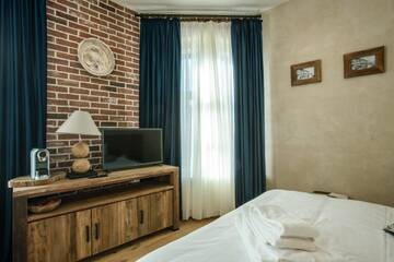 Фото номера Улучшенный номер с кроватью размера «queen-size» Отель ACSA INN г. Крайова 3